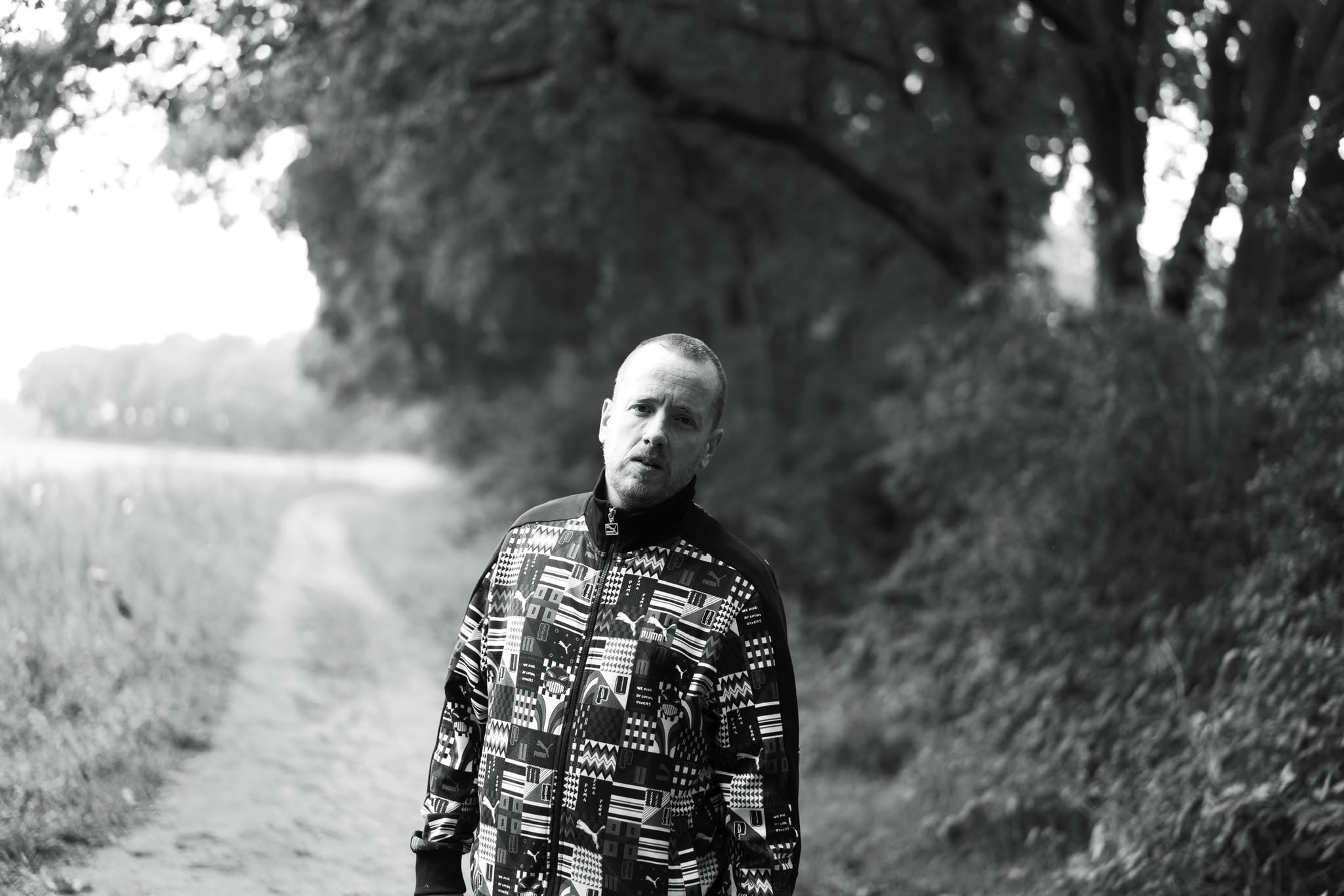 Roel Funcken standing outdoors in a patterned jacket